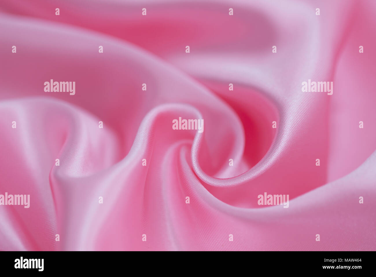 Sfondo astratto di luxury pink stropicciata panno di seta, liquido onde, piega ondulata per texture di sfondo. Foto Stock