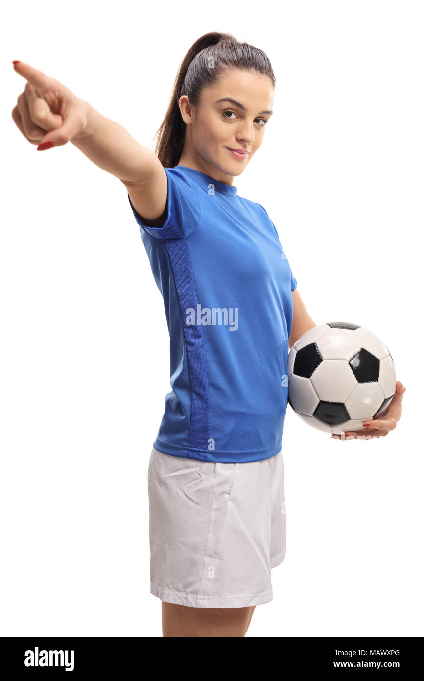 Calcio femminile giocatore con un calcio e puntamento isolati su sfondo bianco Foto Stock