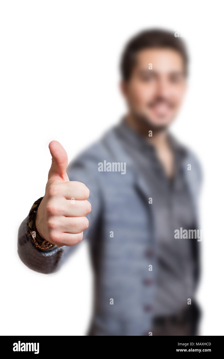 L'uomo con il pollice in un simbolico gesto di approvazione Thumbs up. Seamless sfondo bianco, per il grande messaggio promozionale, Foto Stock