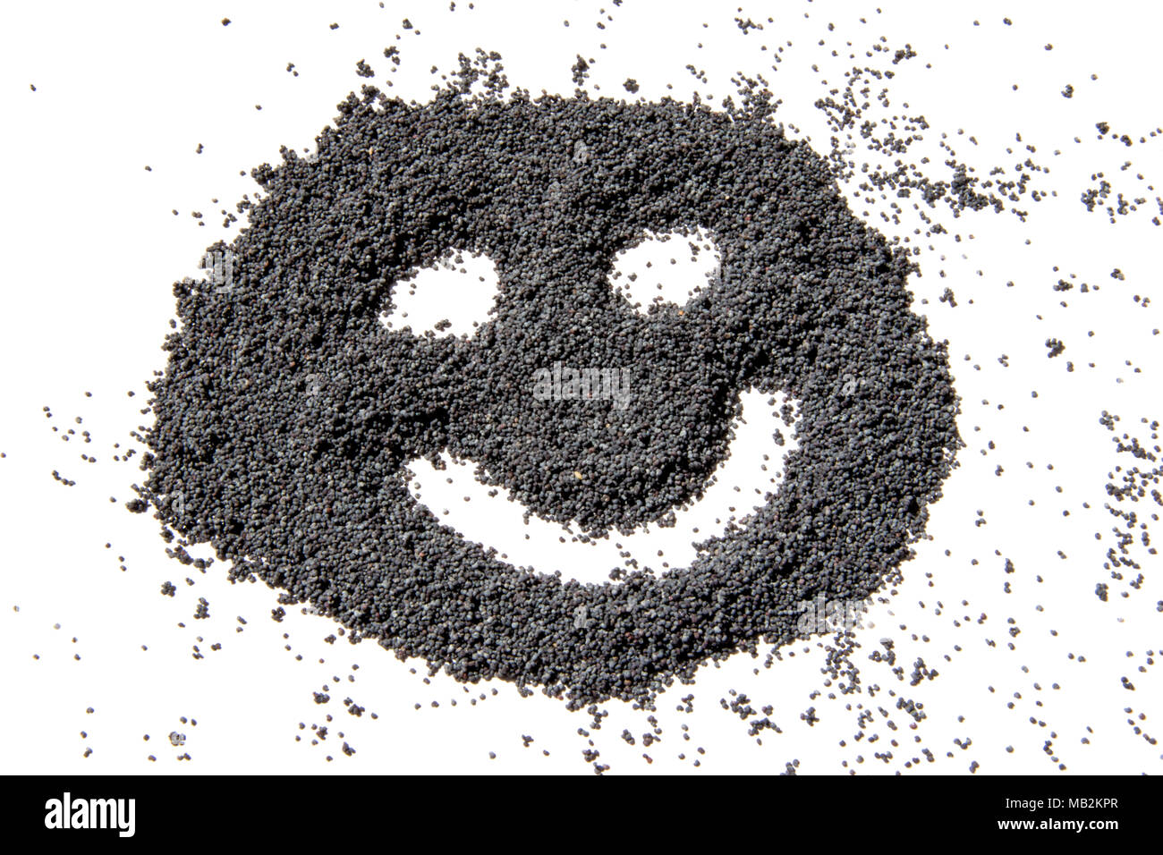 Faccia felice realizzato da essiccato di semi di papavero Foto Stock