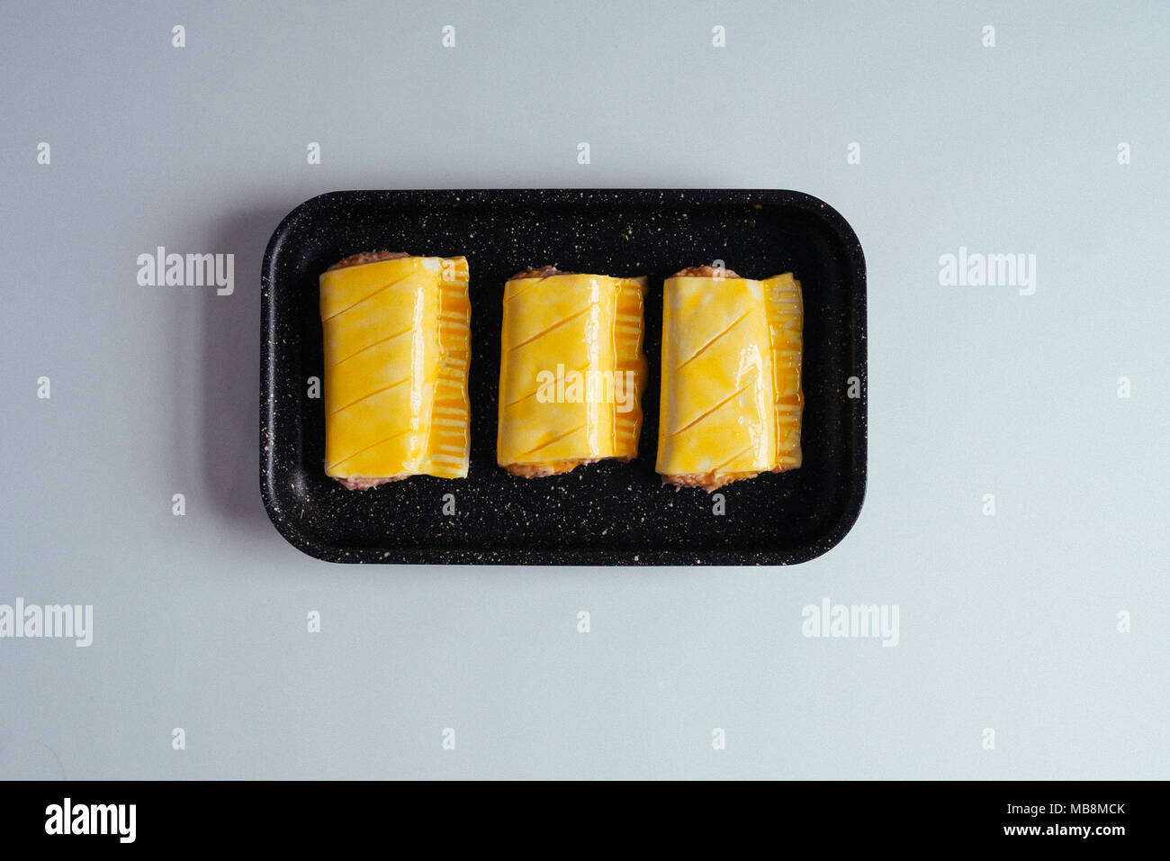 Rotolo di salsiccia pronti per la cottura Foto Stock