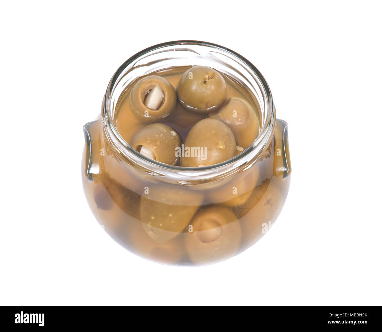 Green colossale mano Olive ripiene con Aglio guanti in vaso Foto Stock