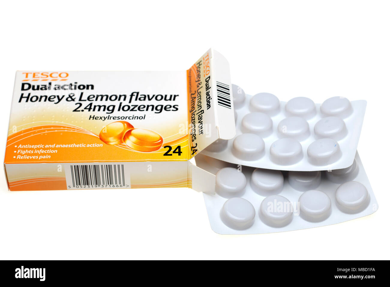 Scatola di Tesco a doppia azione e miele aromatizzato al limone losanghe Foto Stock