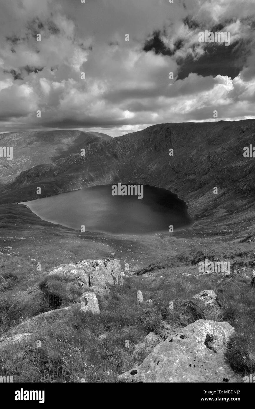 Blea acqua vicino Scafell serbatoio, Mardale valley, Parco Nazionale del Distretto dei Laghi, Cumbria, England, Regno Unito Foto Stock