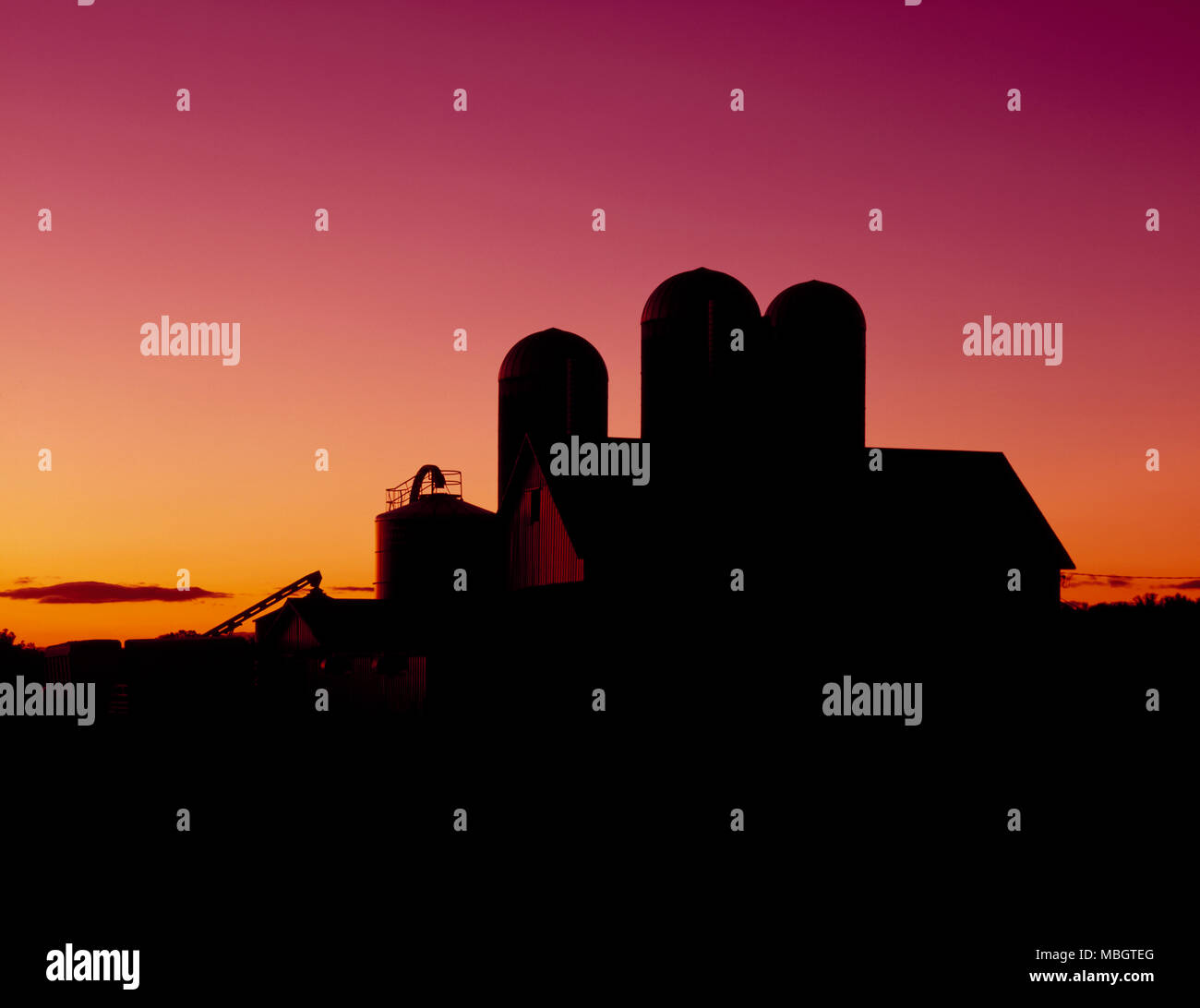 Dairy Barn al tramonto Foto Stock
