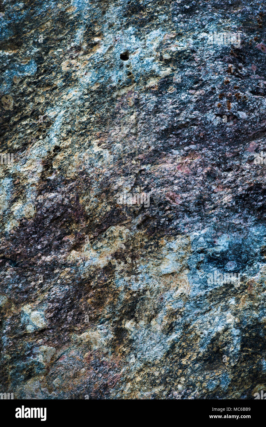 Tessitura della pietra naturale con colorato disegno irregolare. Foto Stock