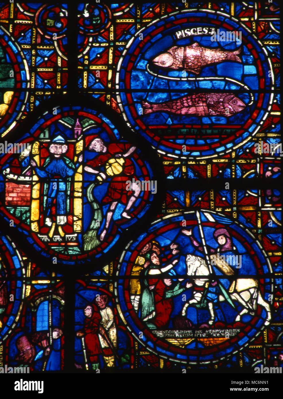 Dettagli della vetrata nella parete sud della cattedrale di Chartres, Francia. Foto Stock