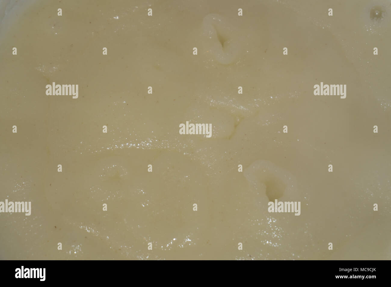 Textured background. Intonaco decorativo pareti, la decorazione esterna della facciata. La texture di beige Foto Stock