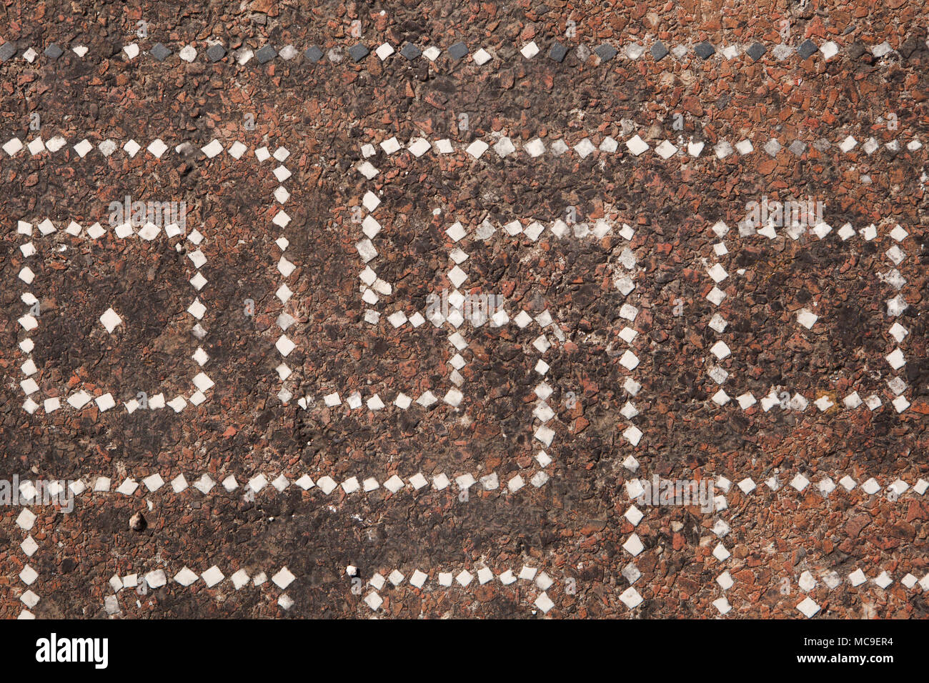 Roman swastika pavimento a mosaico in la casa di abitazione in Paestum, Campania, Italia. Foto Stock