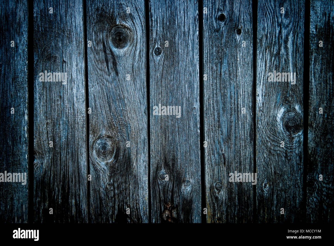 Il vecchio ricco legno grano sfondo texture con nodi. Foto Stock
