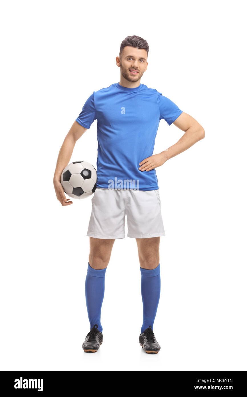 A piena lunghezza Ritratto di un maschio di giocatore di calcio isolati su sfondo bianco Foto Stock