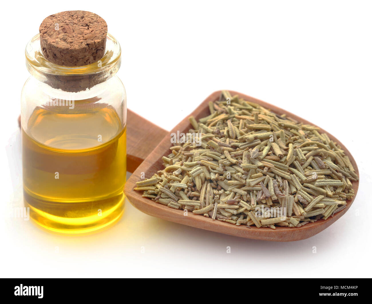 Organici essiccati con rosmarino olio essenziale su sfondo bianco Foto Stock