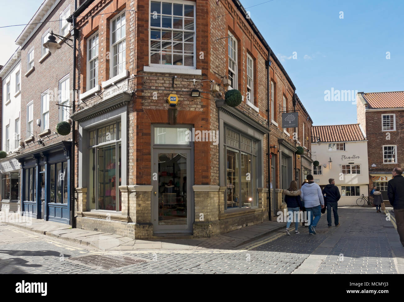 Mulberry negozio e negozi nel centro città Swinegate York North Yorkshire Inghilterra Regno Unito GB Gran Bretagna Foto Stock