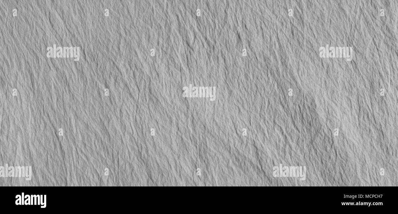 Tela grigia con delicato motivo rigato, sgualciti. Foto ad alta qualità di tessuto di consistenza, sfondo. Foto Stock