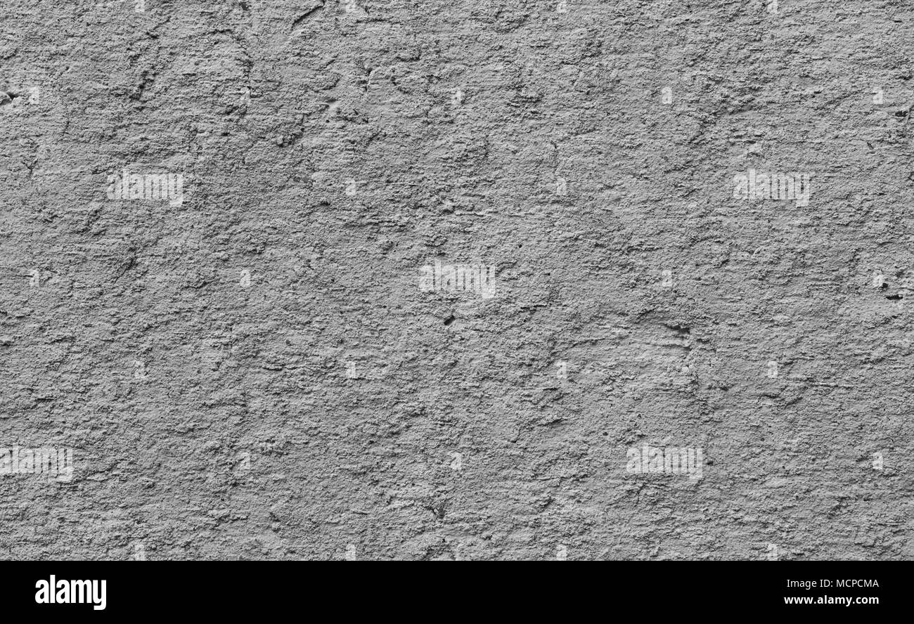Il cemento grigio texture di parete di close-up. Muro grigio Sfondo con dettaglio texture. Foto Stock