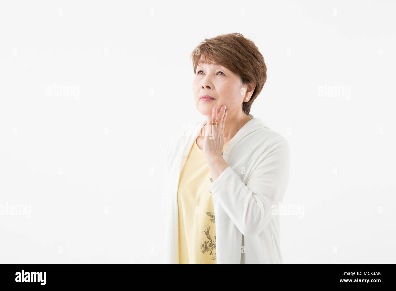 Preoccupato senior donna Foto Stock