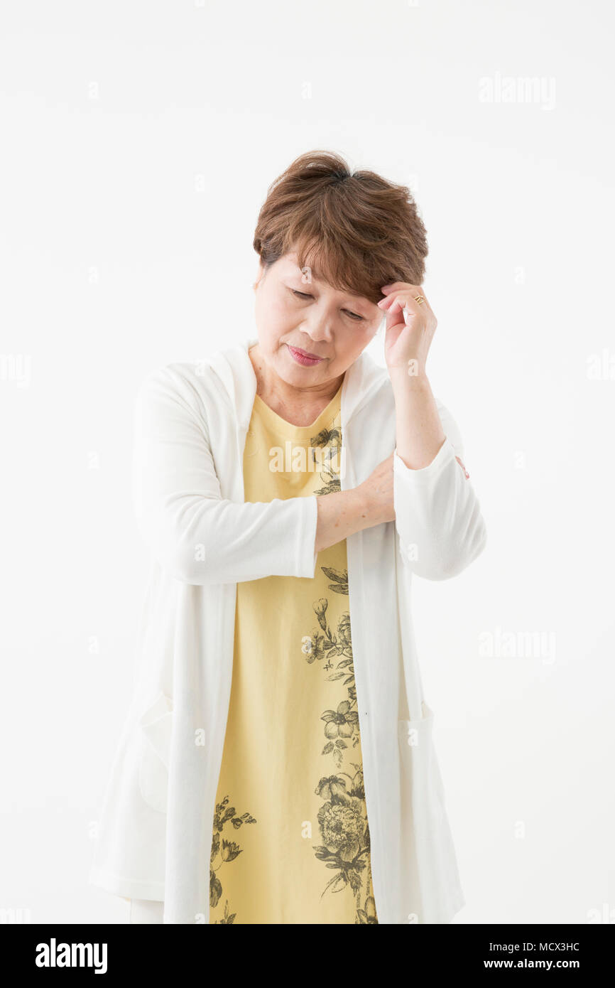 Preoccupato senior donna Foto Stock