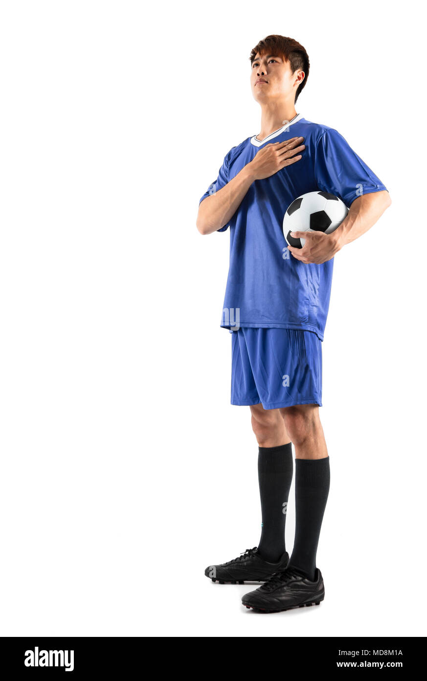 Soccer Football player giovane uomo in piedi Foto Stock