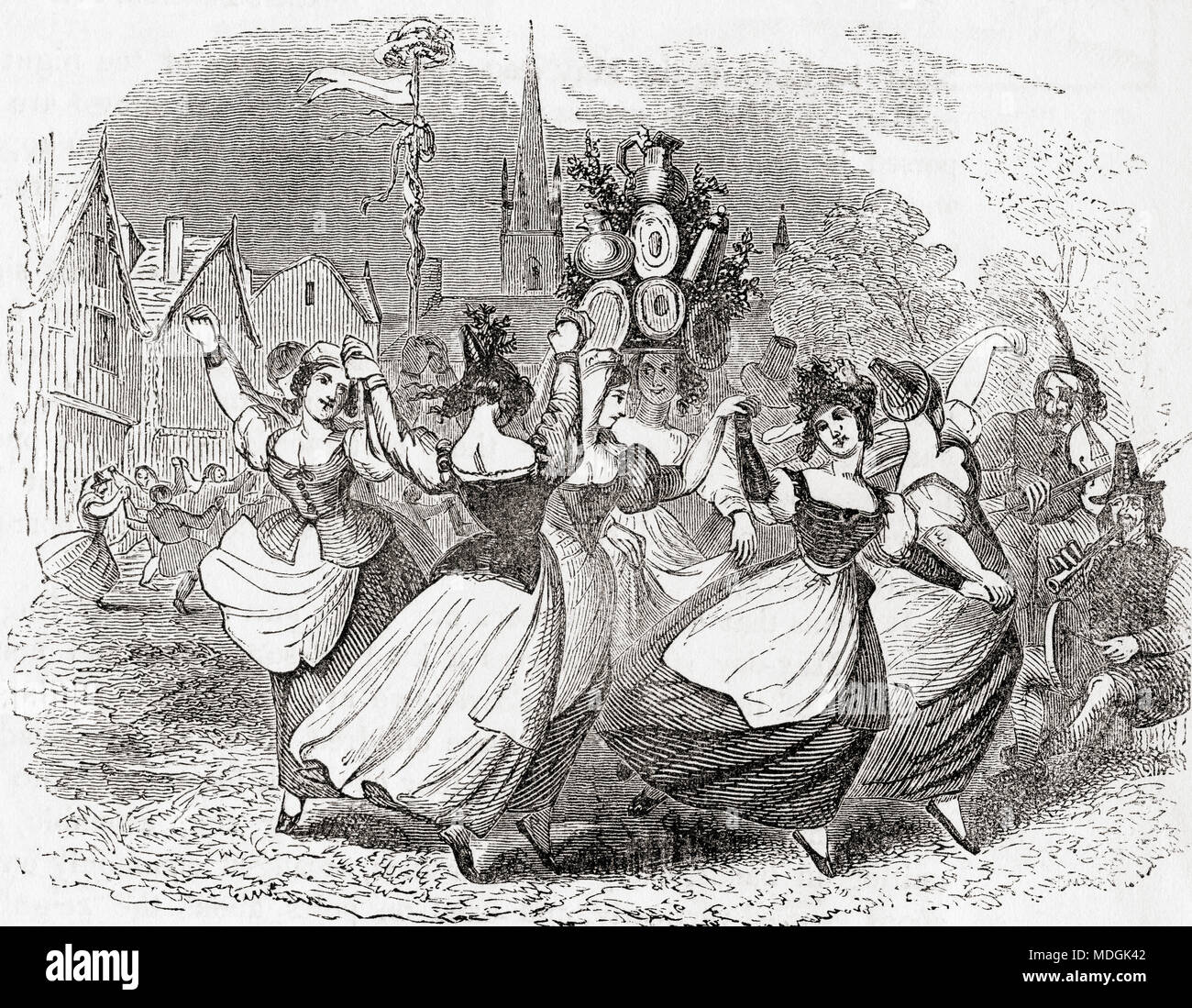 Milkmaid's dance con palo della piastra, giorno di maggio, Inghilterra. La milkmaid della targa-garland è stata una piramide di utensili impilati, eseguito su una stout della fanciulla testa, sotto il quale ha ballato per il violino. Il giorno di maggio la milkmaids wouuld seguire la ghirlanda, sosta presso i loro clienti " Porte e danza. Da Vecchia Inghilterra: un museo pittorico, pubblicato nel 1847. Foto Stock