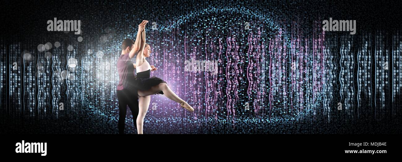 Glamour giovane ballando con la tecnologia digitale e interfaccia incandescente luce scintillante Foto Stock