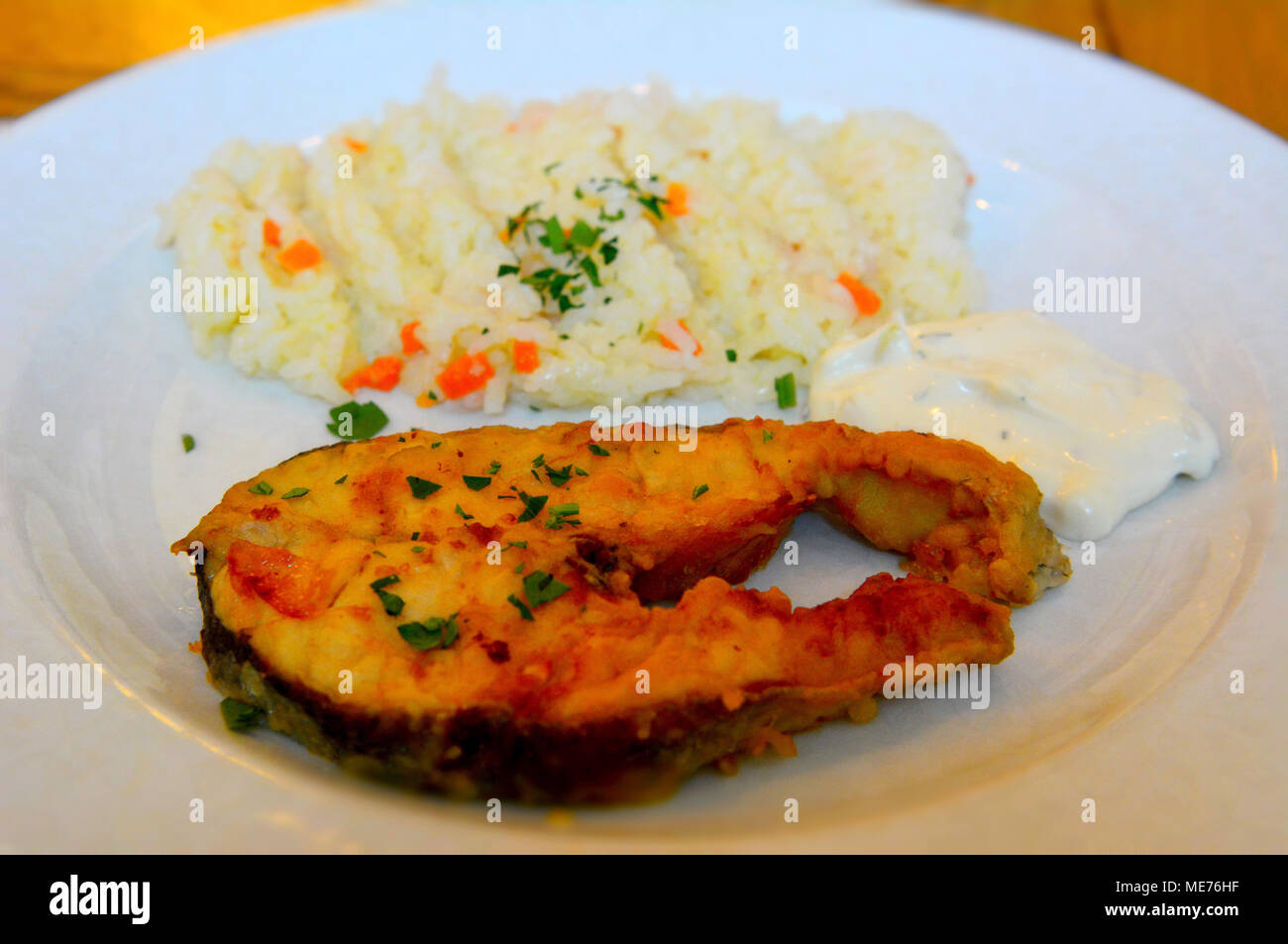 Piatto di merluzzo con riso Foto Stock