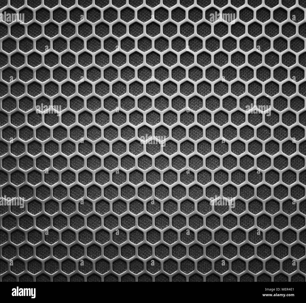 Abstract in acciaio o metallo modello a trama con celle esagonali come Background Industriale Foto Stock