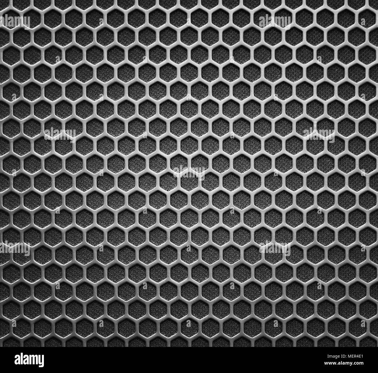 Abstract in acciaio o metallo modello a trama con celle esagonali come Background Industriale Foto Stock