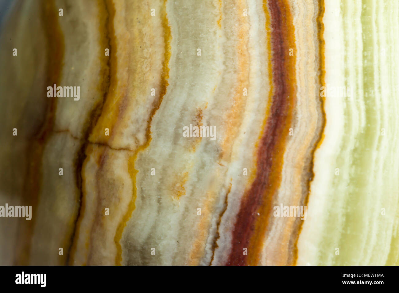 Foto macro texture lucido pietra onice. Foto per il sito sulla geologia, pietre preziose, gioielli, artigianato, textures, art. Foto Stock