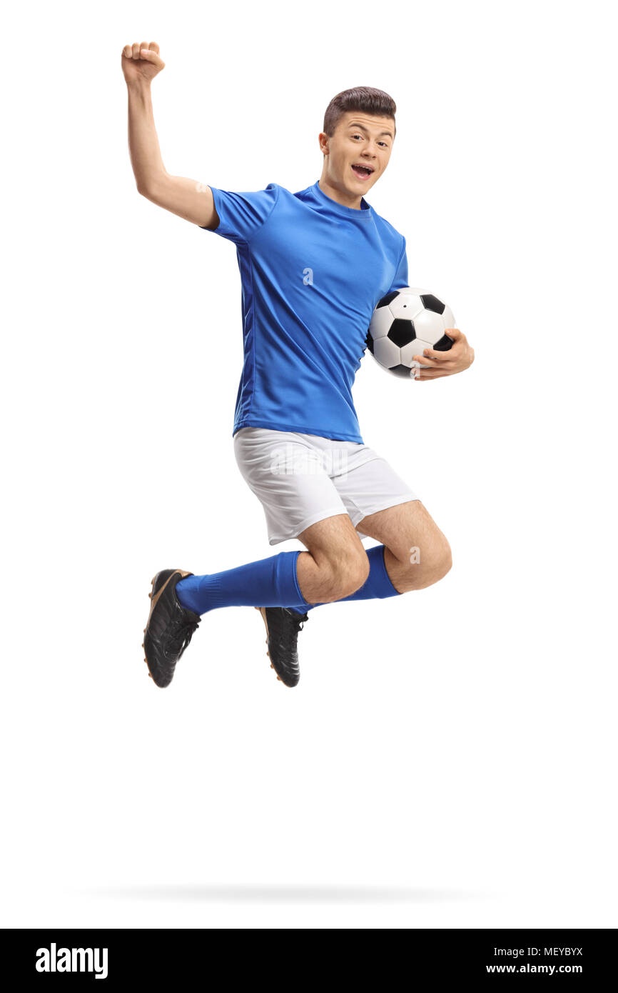 Overjoyed teenage soccer player jumping isolati su sfondo bianco Foto Stock