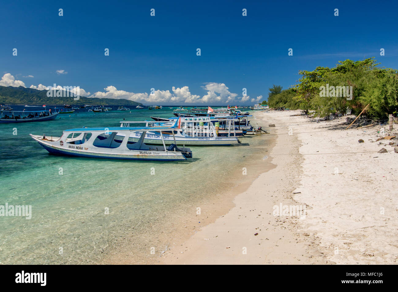 Gili Trawangan, vicino alla costa del nord-ovest dell'Isola di Lombok. Caratterizzata da spiagge sabbiose orlate da palme Foto Stock