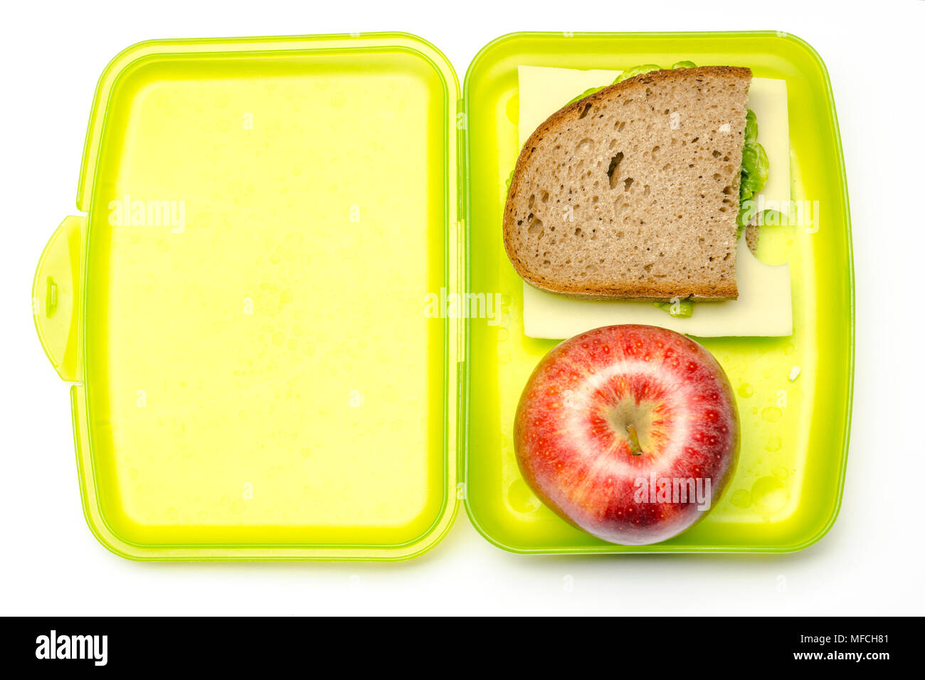 Lunchbox verde con pane e Apple Foto Stock