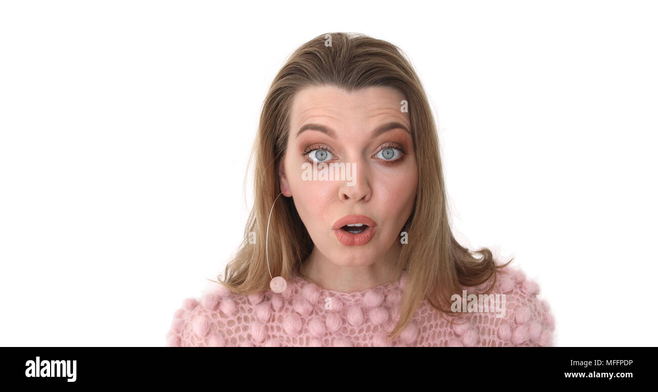 Volto femminile in stato di shock in rosa Close Up Foto Stock