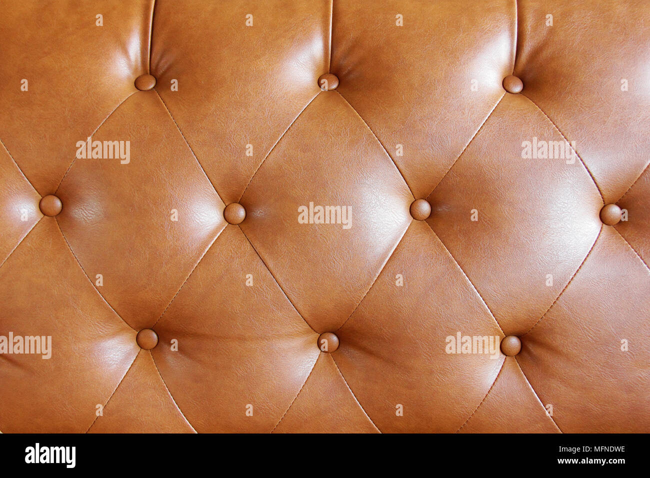 Divani in pelle marrone sfondo texture con dettagli Foto Stock