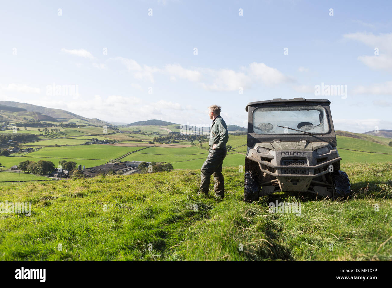 Agricoltore topografico con terra gator Foto Stock