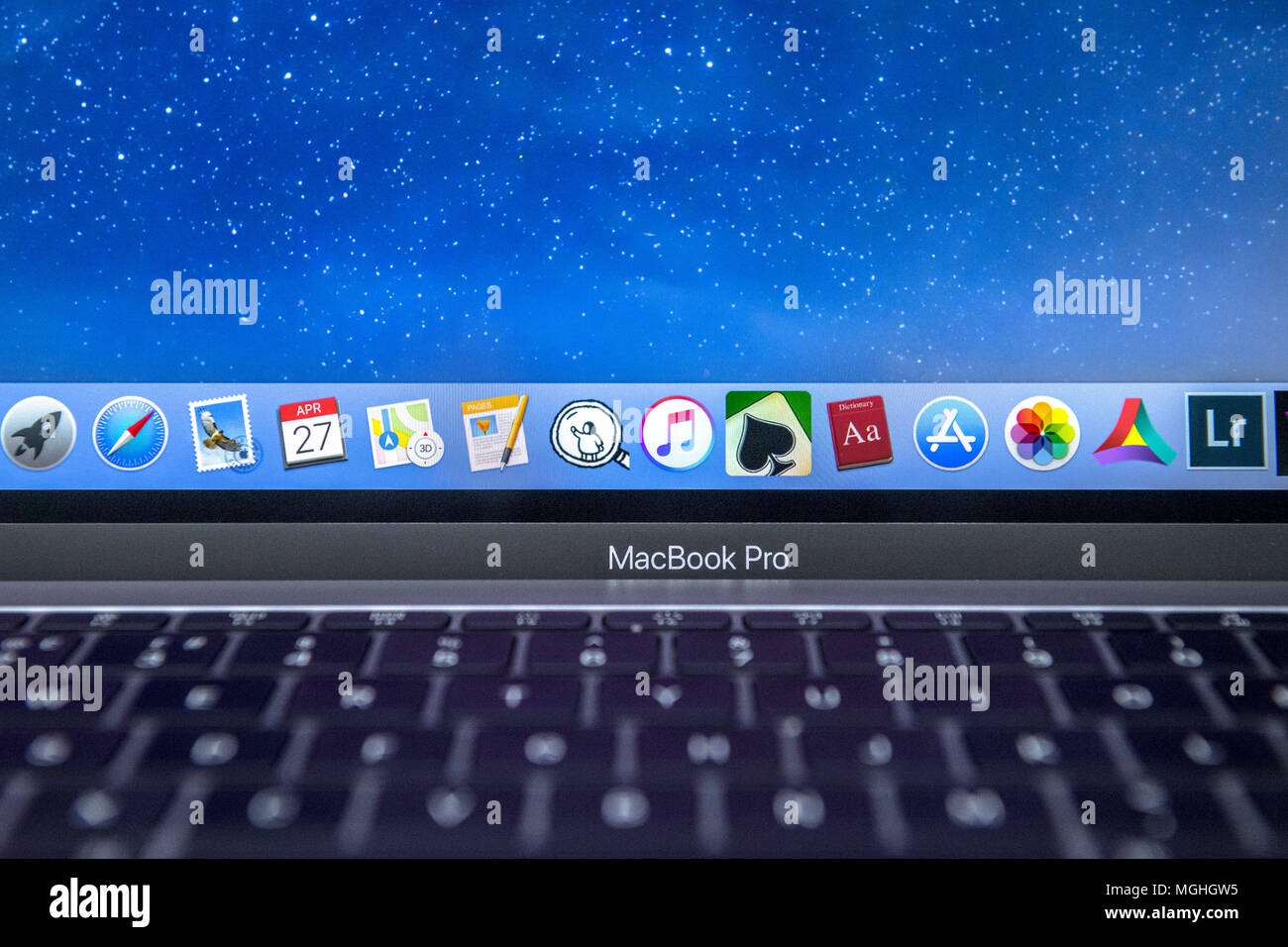 Apple MacBook Pro scheda chiave con dock bar. Foto Stock