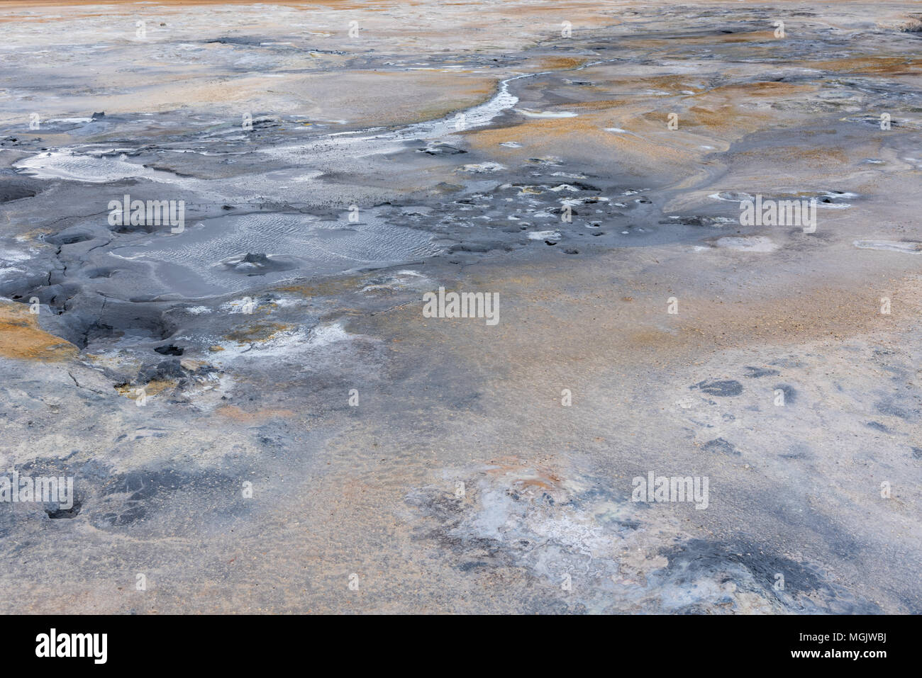 Hverir, dettagli di terra, sabbia e pozzanghere Foto Stock