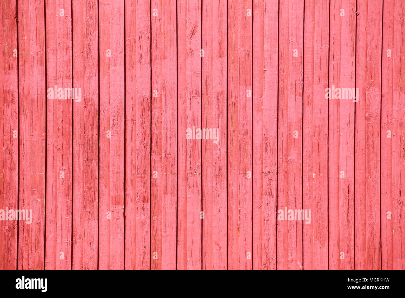 Verticale di listelli in legno con falu vernice rossa. Foto Stock