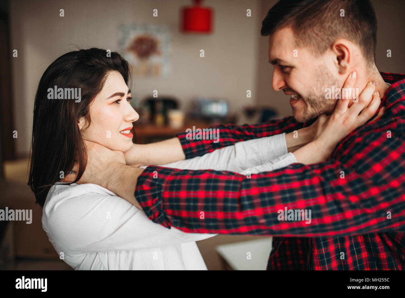 Il marito e la moglie a urlare contro ogni altra lite Foto Stock