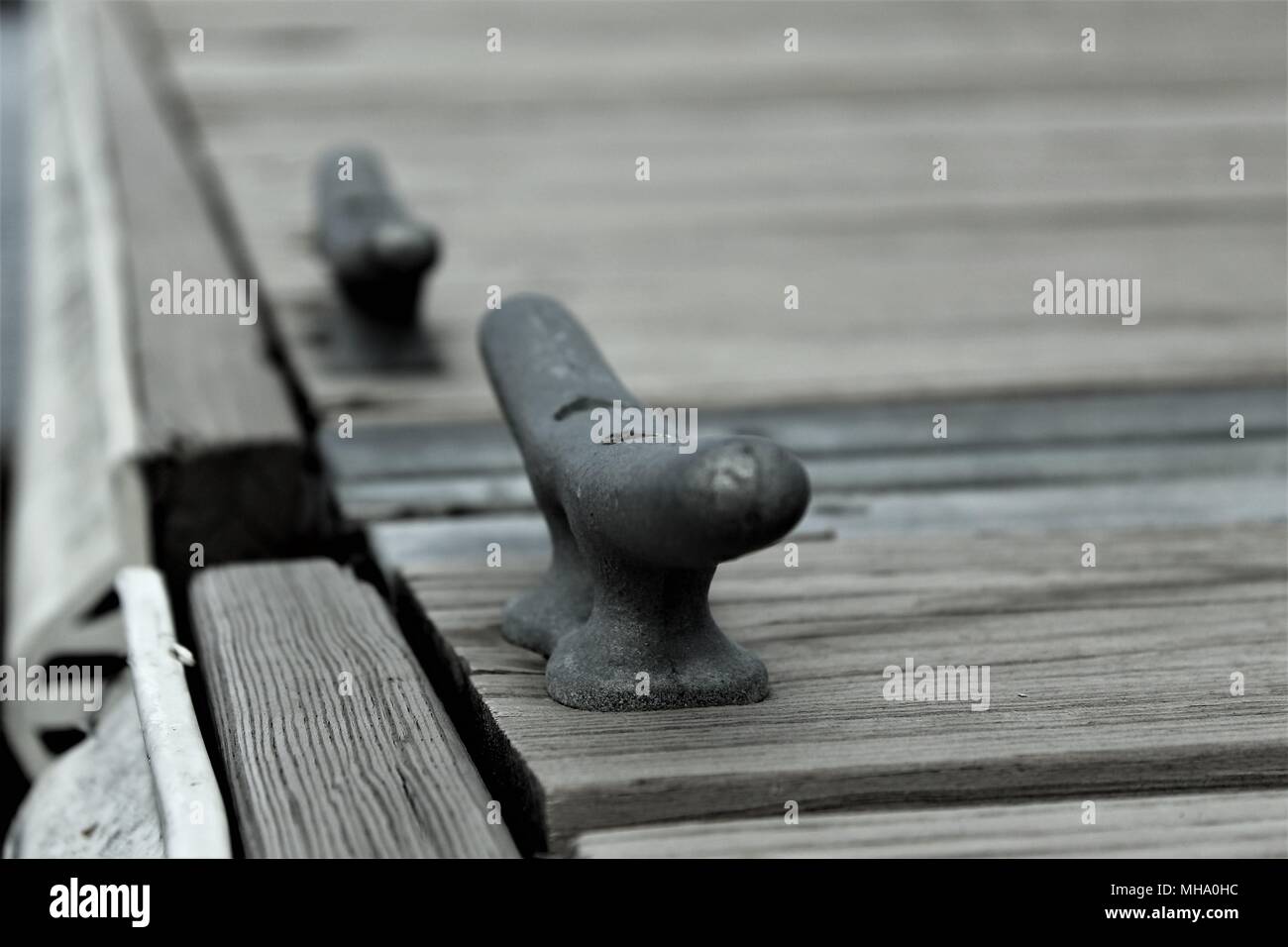 Primo piano di un dock spiovente gancio sulla spiaggia Foto Stock