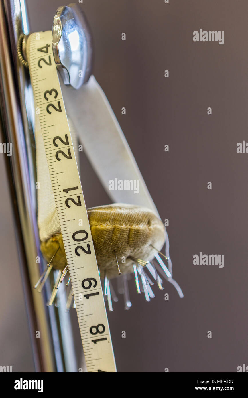 Metro a nastro e spine Foto Stock