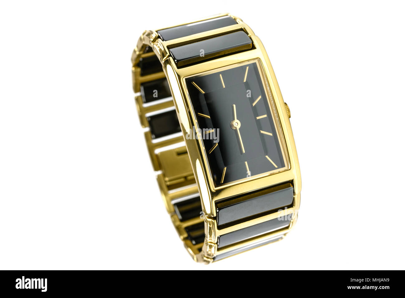 Femmina elegante orologio d'oro isolato su uno sfondo bianco in close-up Foto Stock