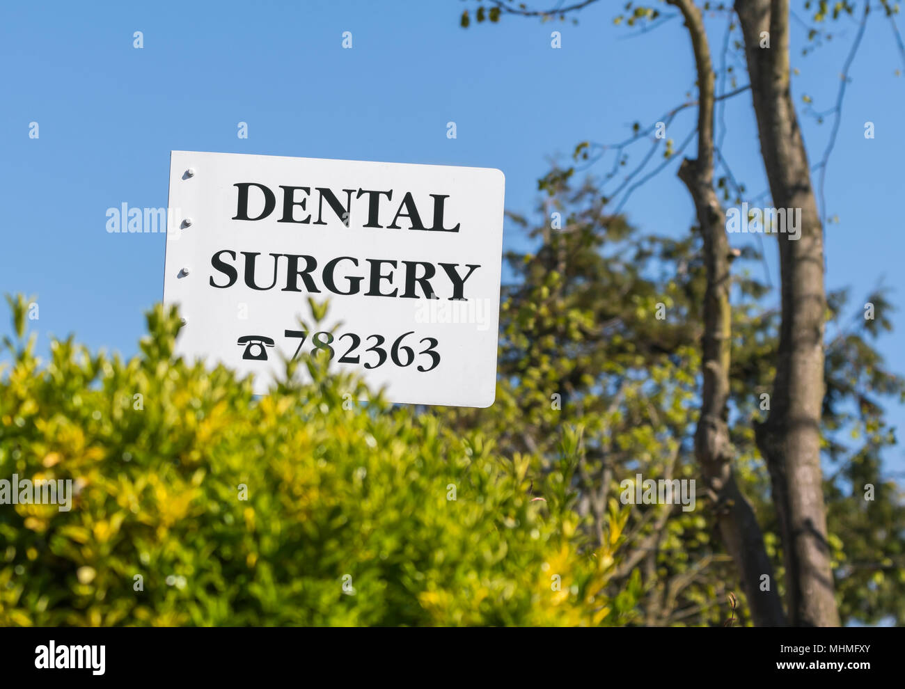 Un intervento di chirurgia dentale segno nel Regno Unito. Dentistico. Dentisti pratica. Foto Stock