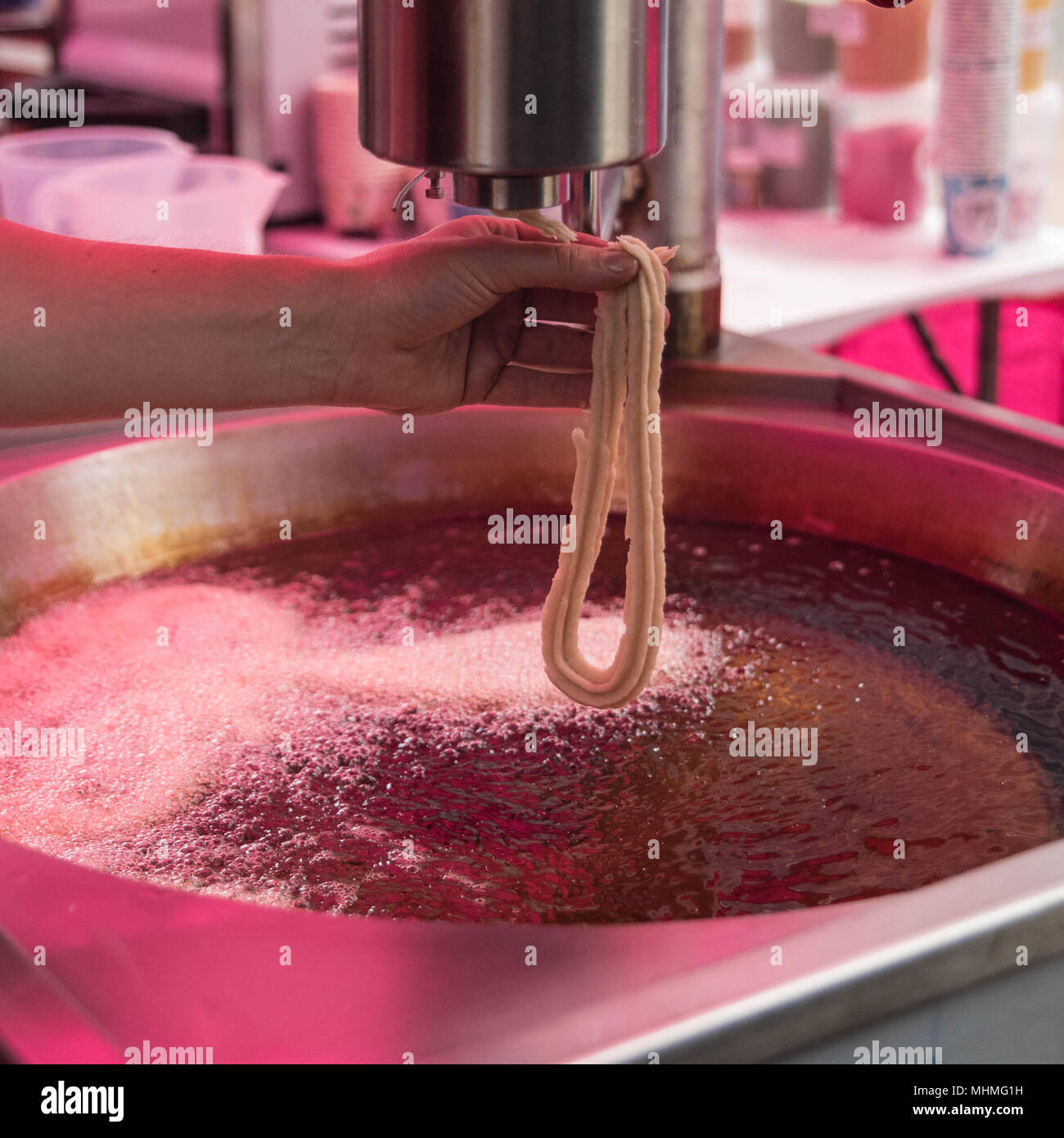 Churros in vendita in bancarelle al gusto della molla food fair in Banbury, Oxfordshire, il 22 aprile 2018 Foto Stock