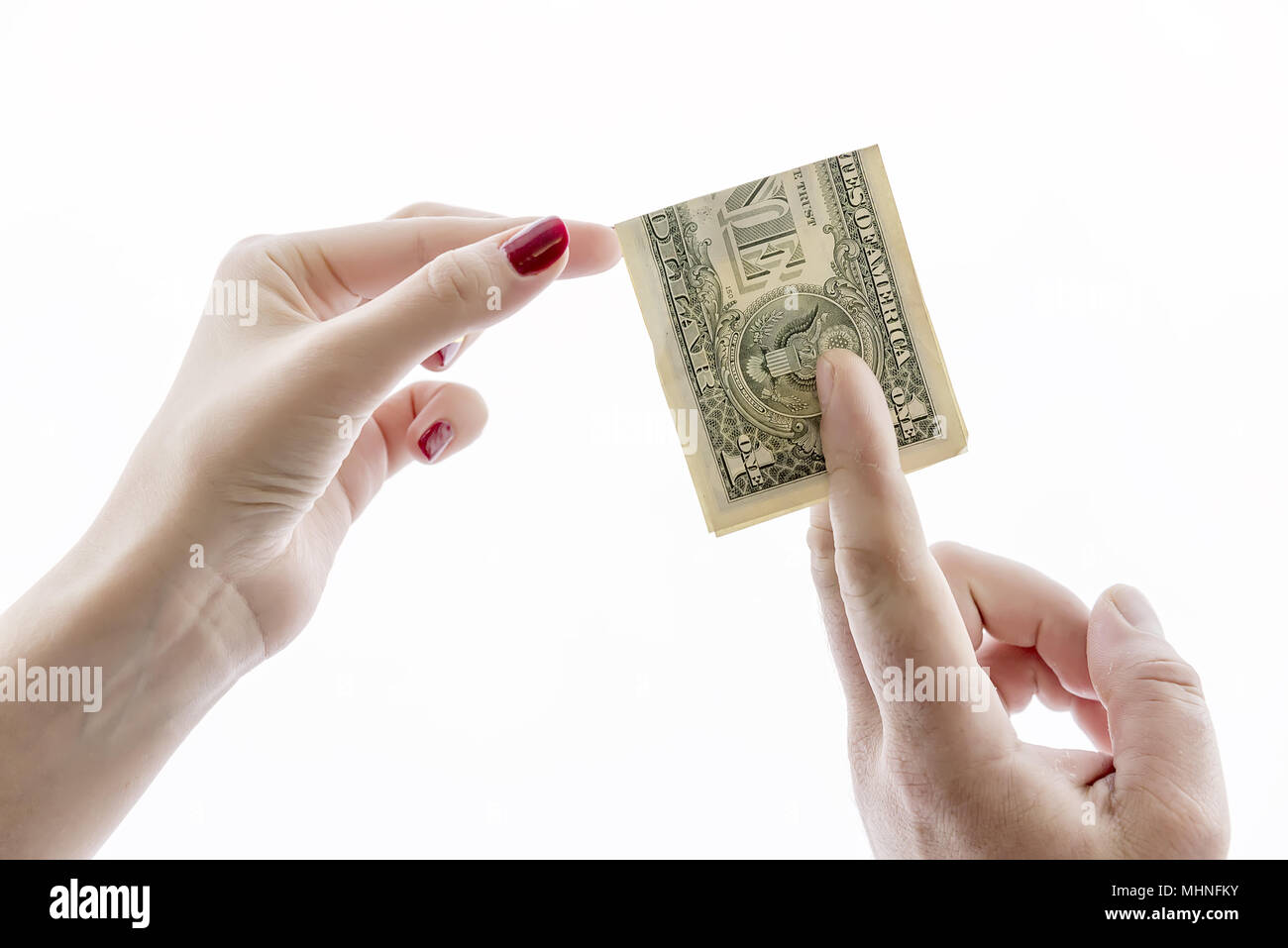 Un dollaro in mano, un uomo dà una donna il denaro per il business Foto Stock