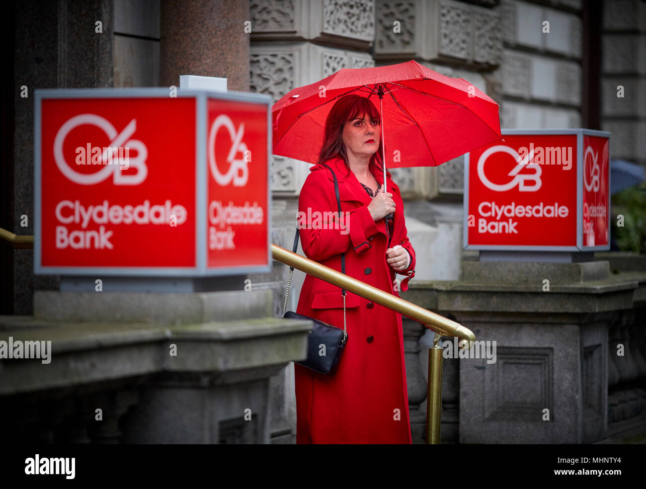 Glasgow in Scozia, rosso Clydesdale bank segni Foto Stock