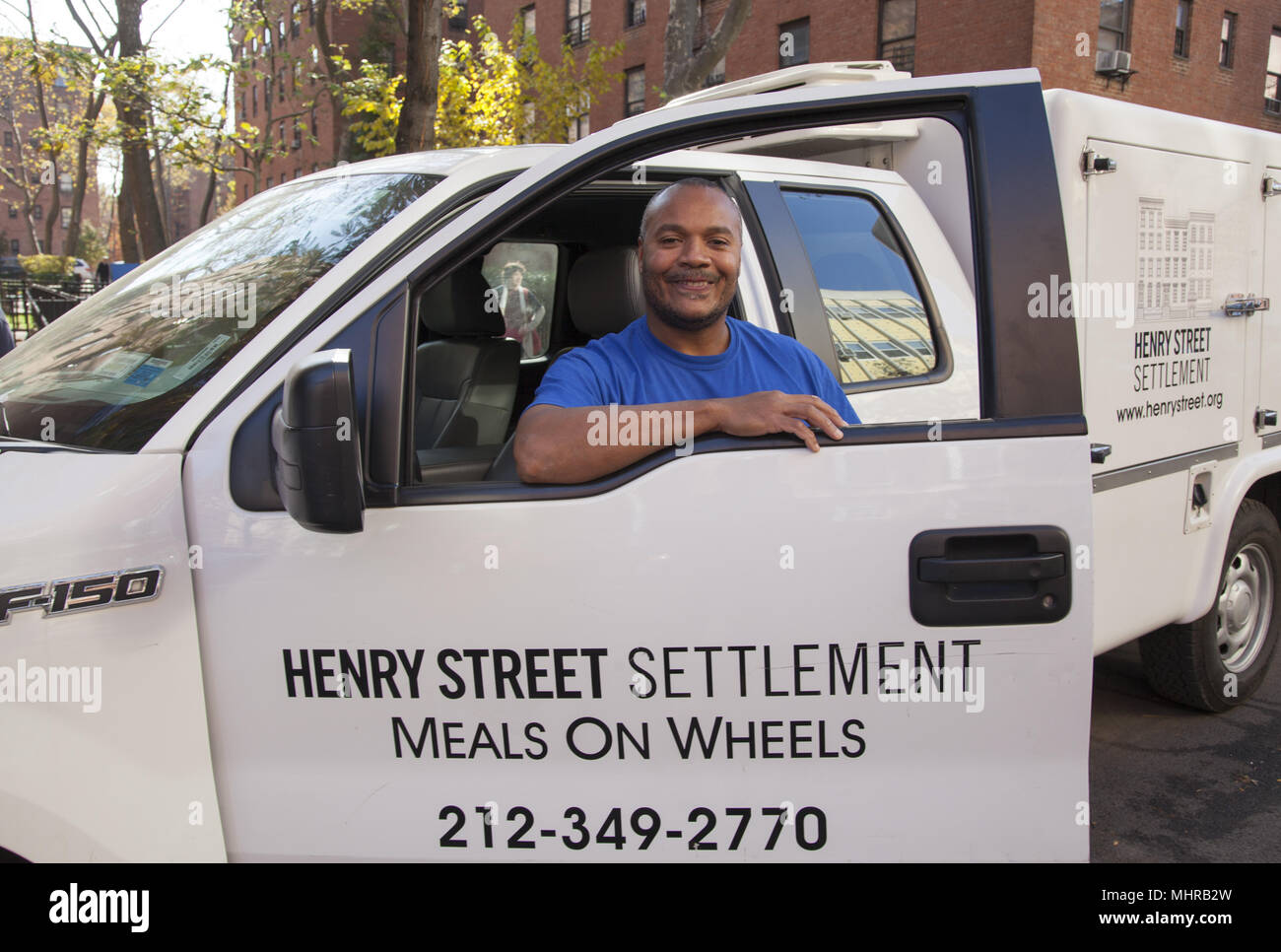 Pasti su ruote driver sul Lower East Side di New York City. Foto Stock