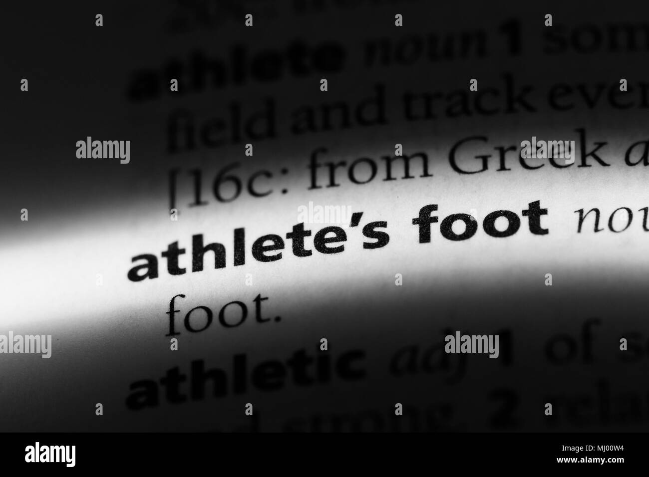Il piede d'atleta parola in un dizionario. del piede atleta concetto. Foto Stock