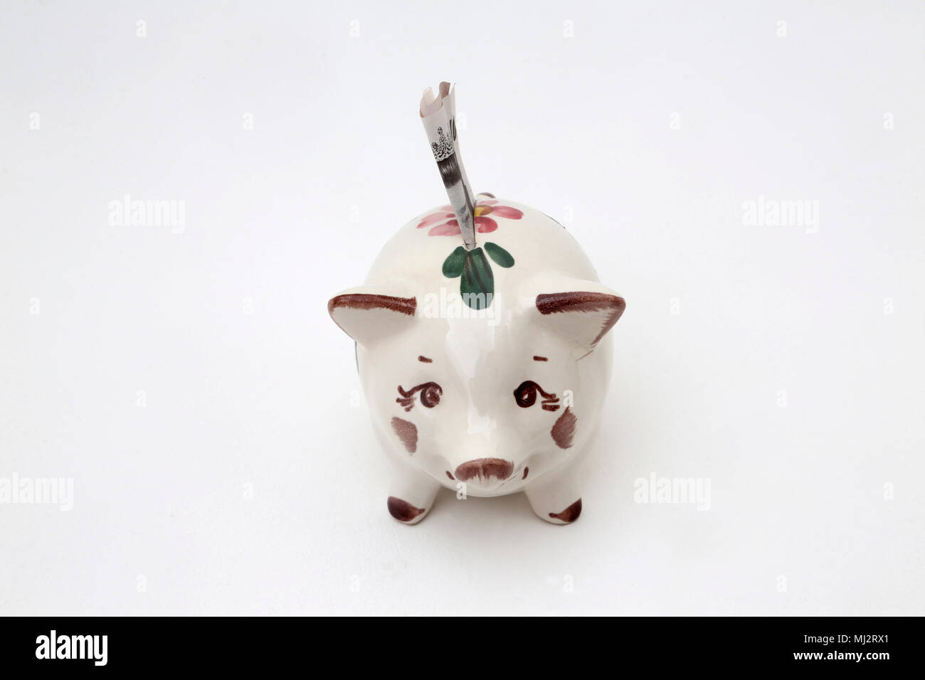 Salvadanaio Salvadanaio con il vecchio dieci Pound nota fuori di circolazione nel 2017 Foto Stock