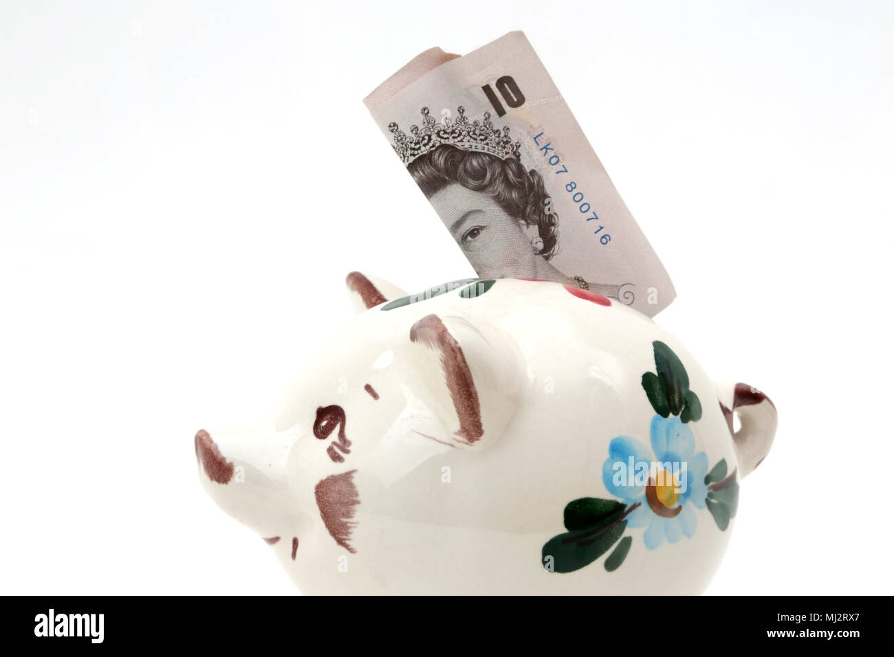 Salvadanaio Salvadanaio con il vecchio dieci Pound nota fuori di circolazione nel 2017 Foto Stock