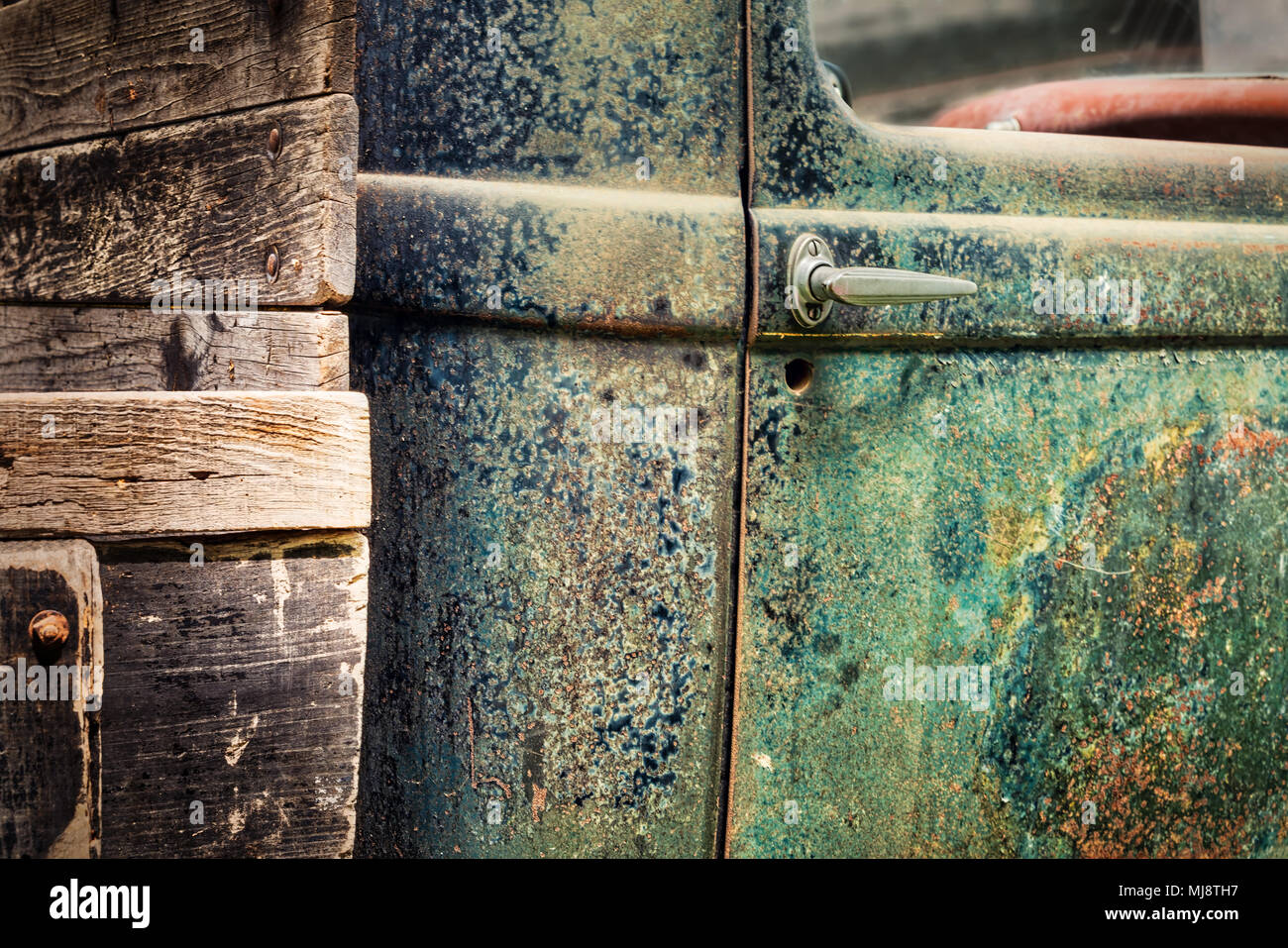 La arrugginita porta passeggero di un 1935 American pickup. Foto Stock